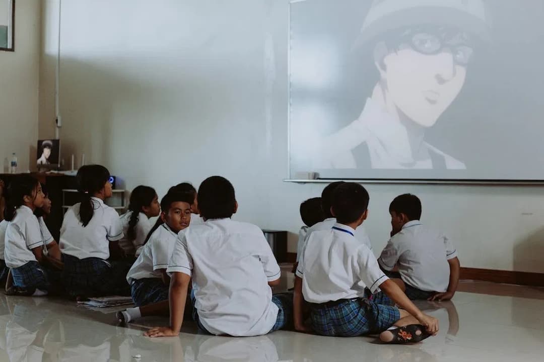 ESL students engaged with a movie in class